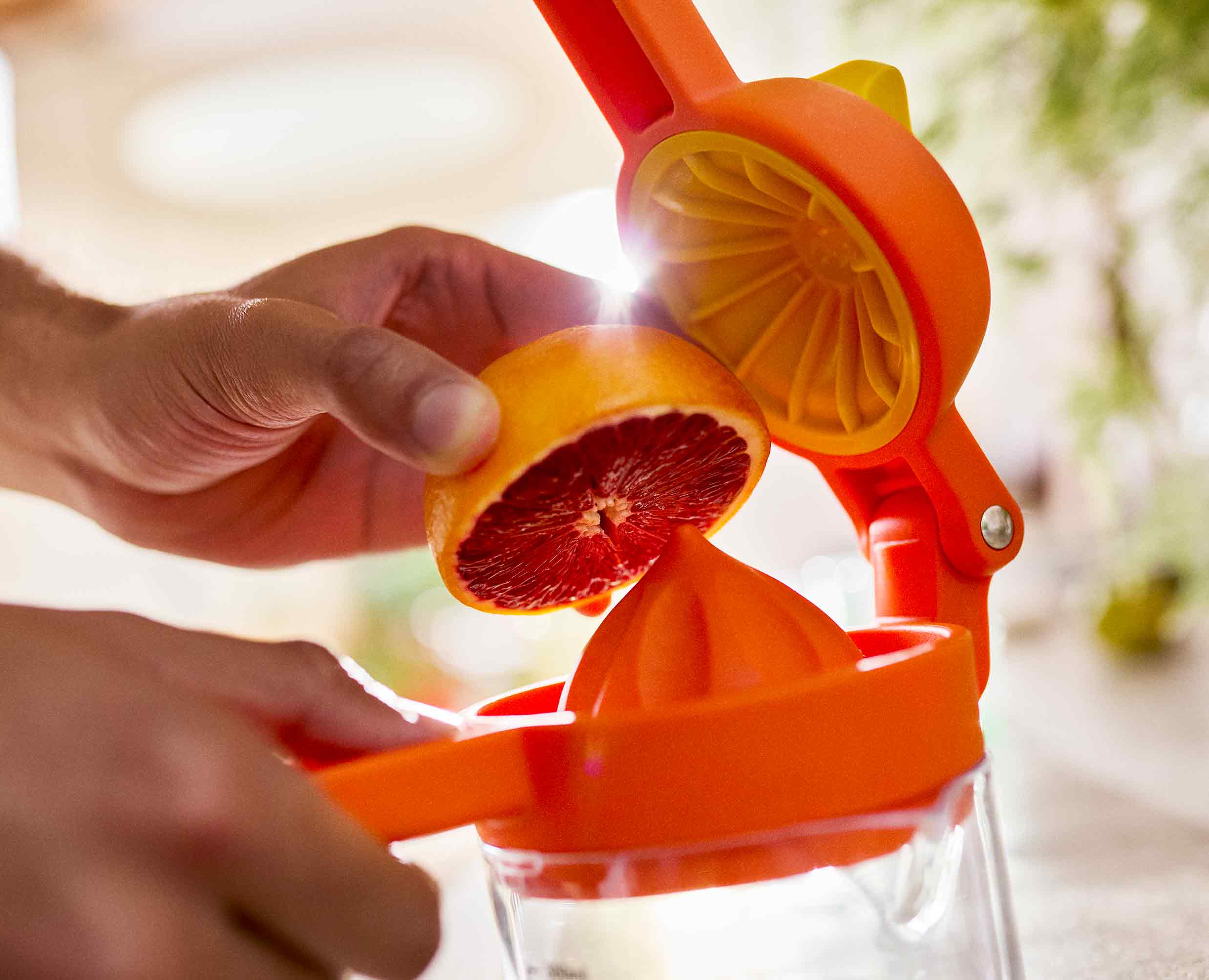 JuiceMax™ Plus Dual-Action Orange Citrus Press with Measuring Cup - Image 4
